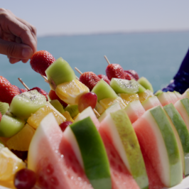 a cake with fruit on a plate