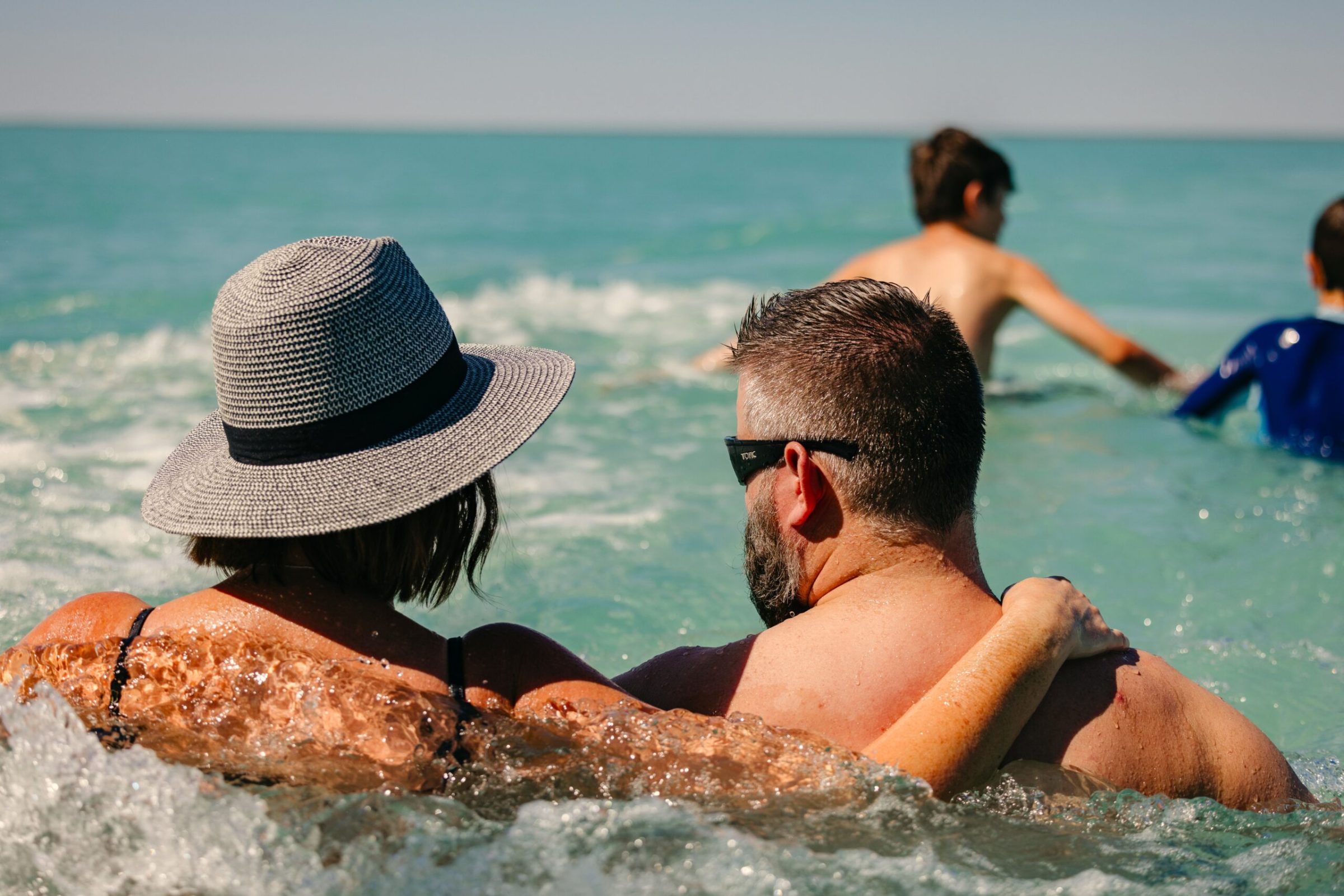 Guests swimming in boom net
