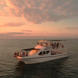a small boat in a large body of water