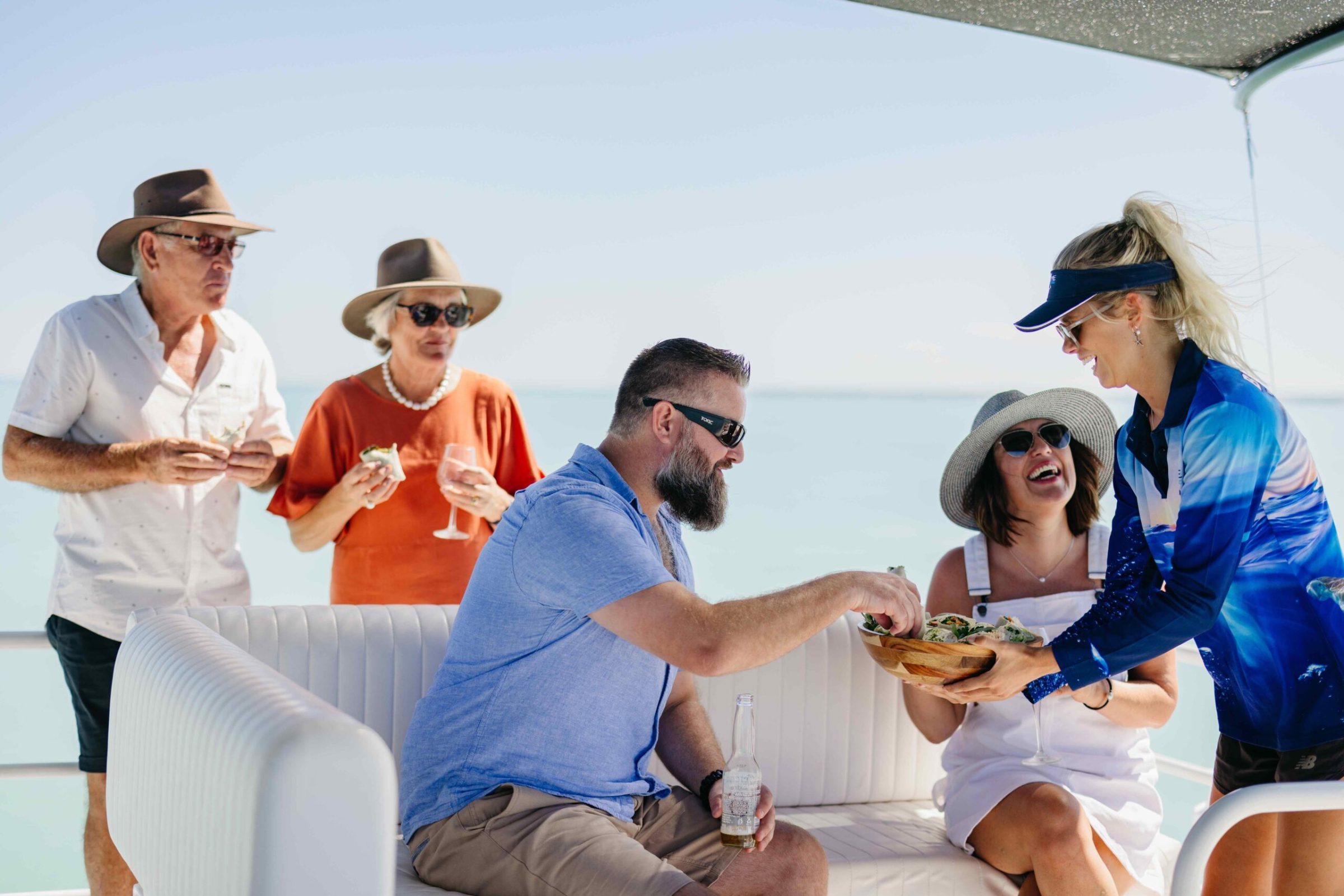 a couple of people that are sitting on a boat