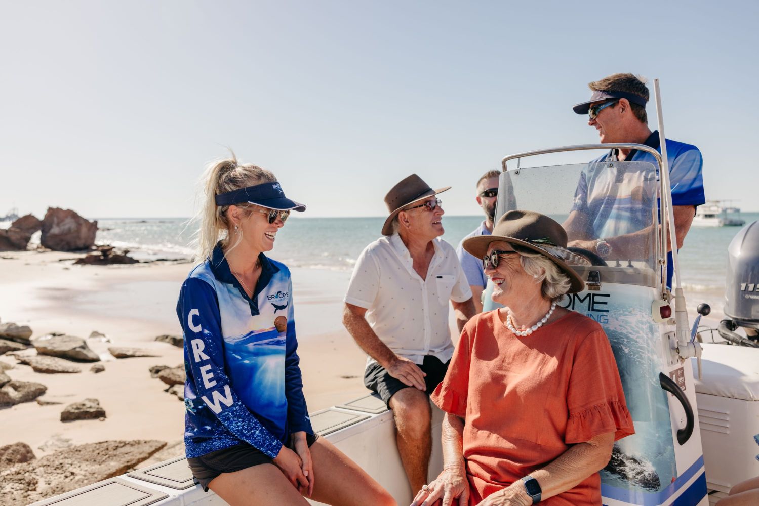 a group of people on a beach