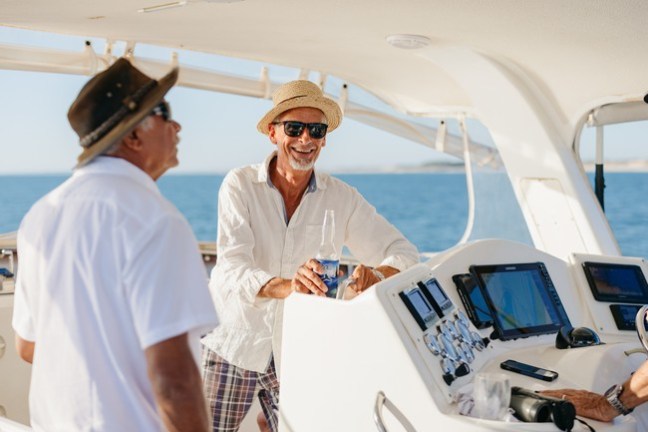 a man riding on the back of a boat