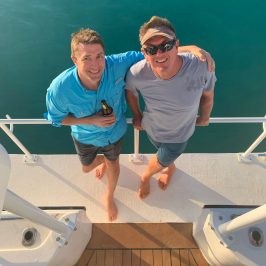 a man sitting on a boat