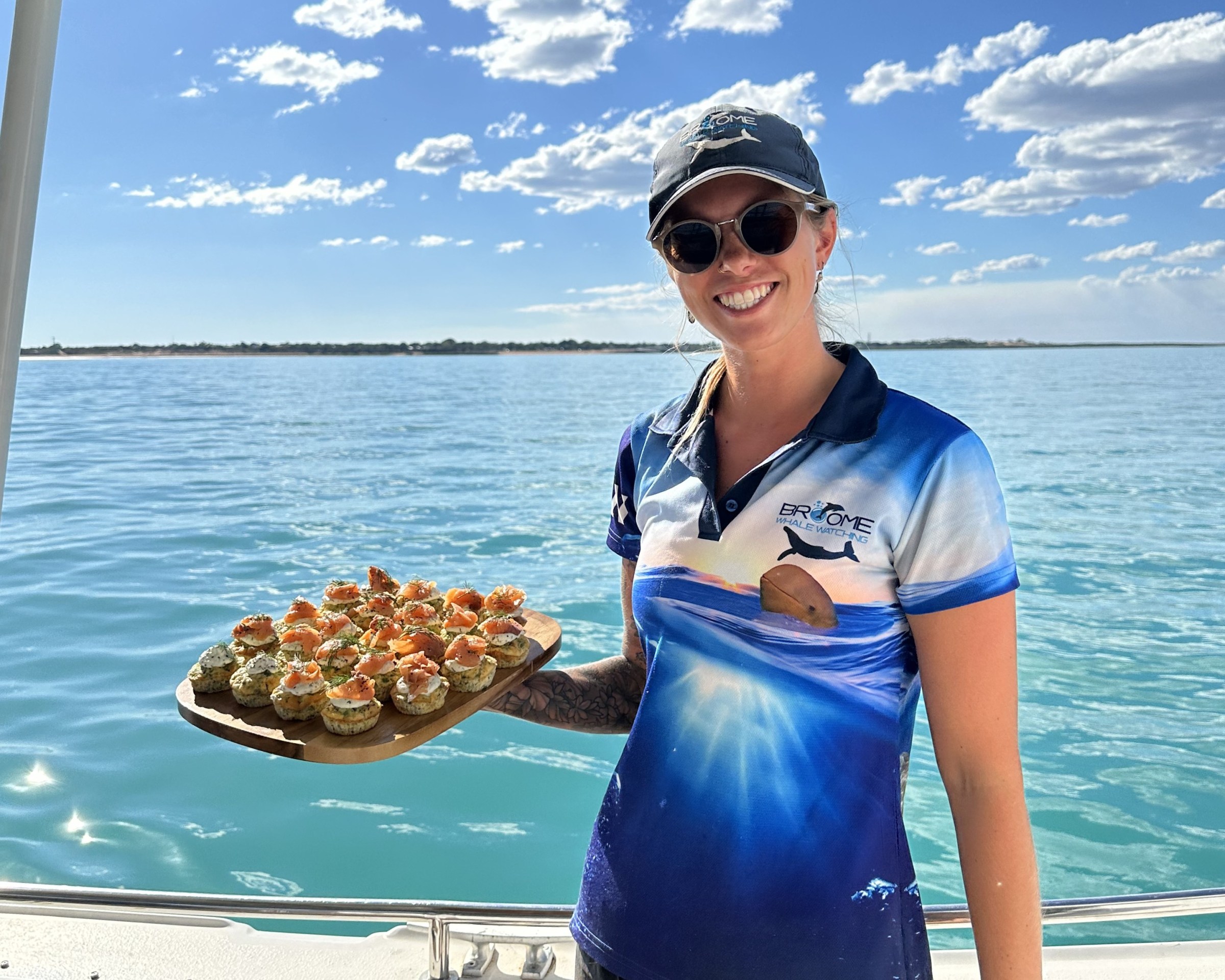 a person standing in front of a body of water