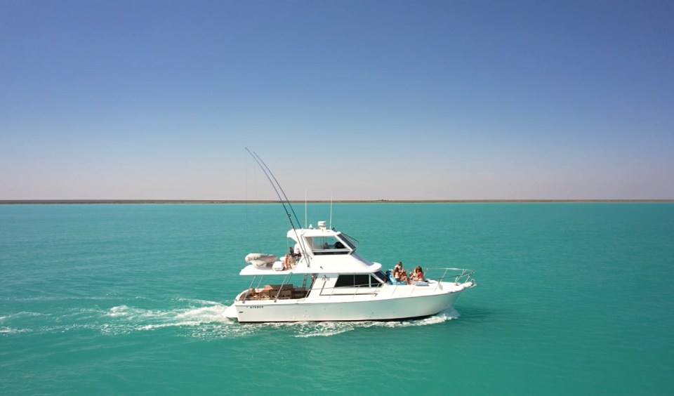 a small boat in a body of water