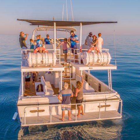 a small boat in a body of water